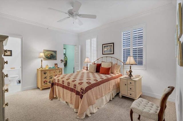 bedroom with light carpet, baseboards, and crown molding