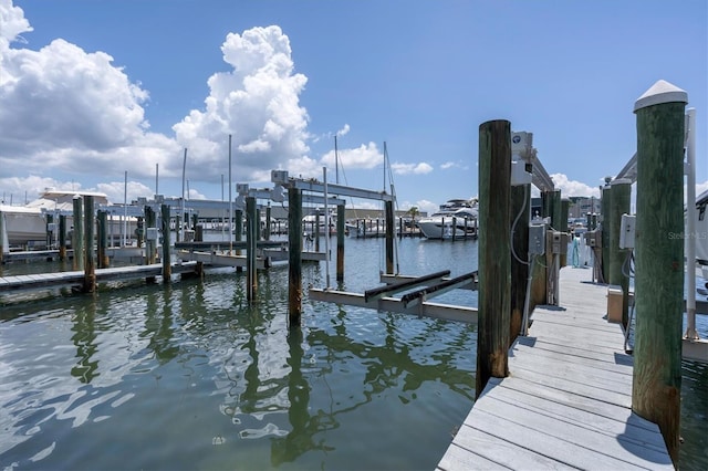 dock area featuring a water view and boat lift