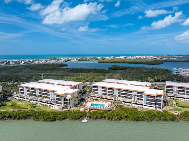 bird's eye view with a water view