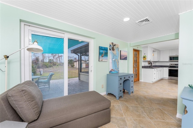 interior space featuring visible vents and baseboards