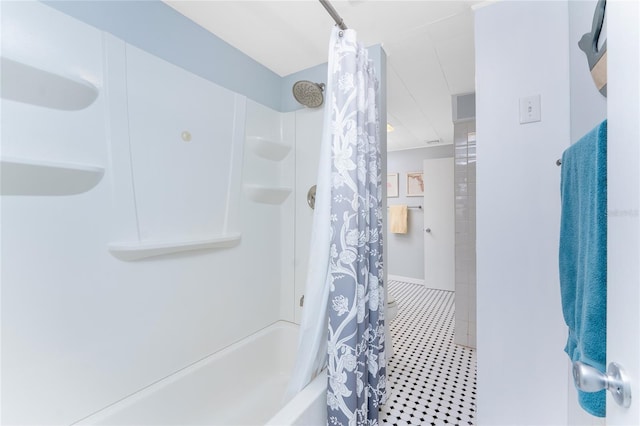 full bathroom with shower / tub combo and tile patterned flooring