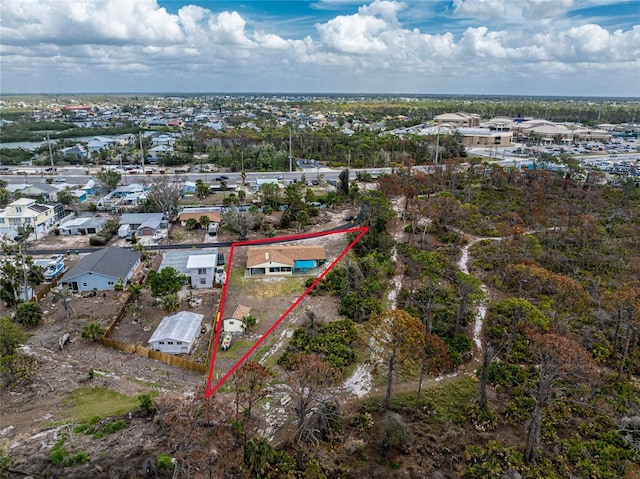 birds eye view of property with a residential view