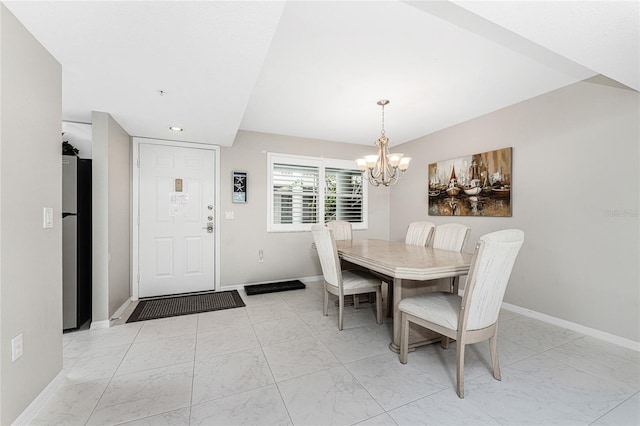 dining room with recessed lighting, marble finish floor, a notable chandelier, and baseboards