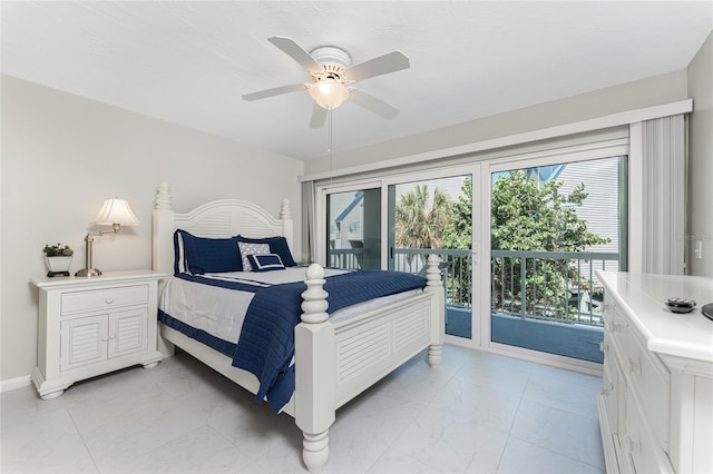 bedroom featuring ceiling fan, marble finish floor, and access to exterior