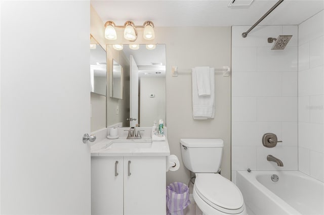 bathroom with toilet, visible vents, bathtub / shower combination, and vanity