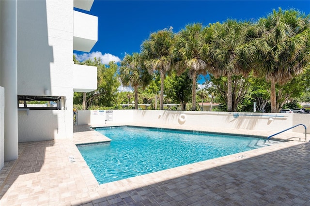 community pool featuring a patio