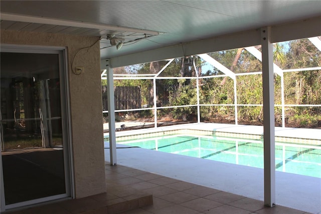 pool with a patio area and a lanai