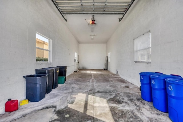 garage featuring a garage door opener