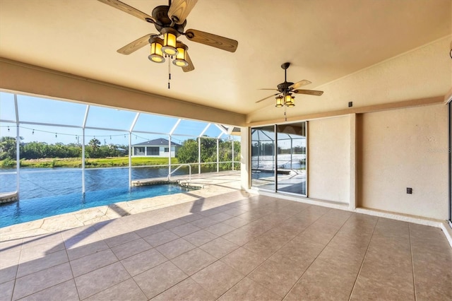 outdoor pool with a patio, a lanai, and a ceiling fan