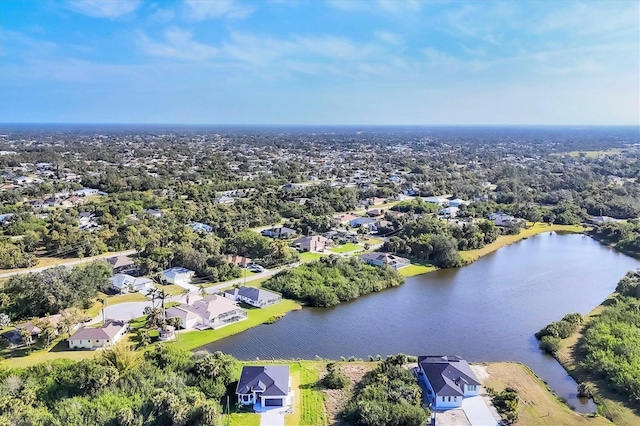 bird's eye view featuring a water view and a residential view