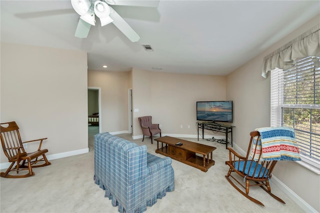 living area with visible vents, a ceiling fan, recessed lighting, carpet flooring, and baseboards