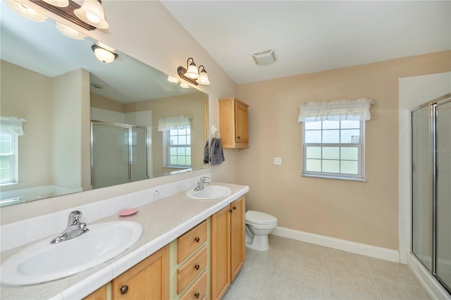 bathroom featuring a sink, visible vents, and a shower stall