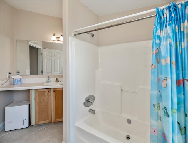 bathroom featuring tile patterned flooring, vanity, and shower / tub combo with curtain