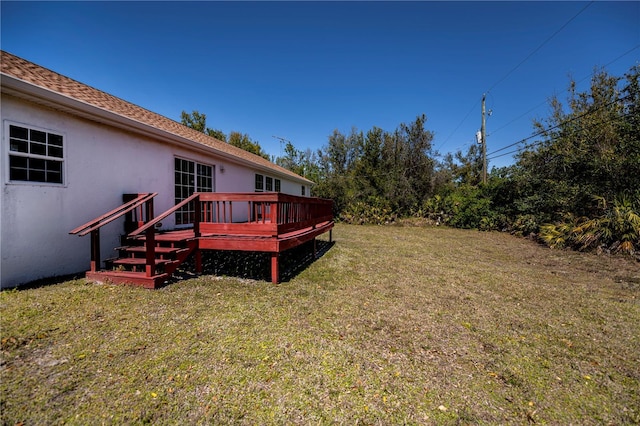 view of yard with a deck