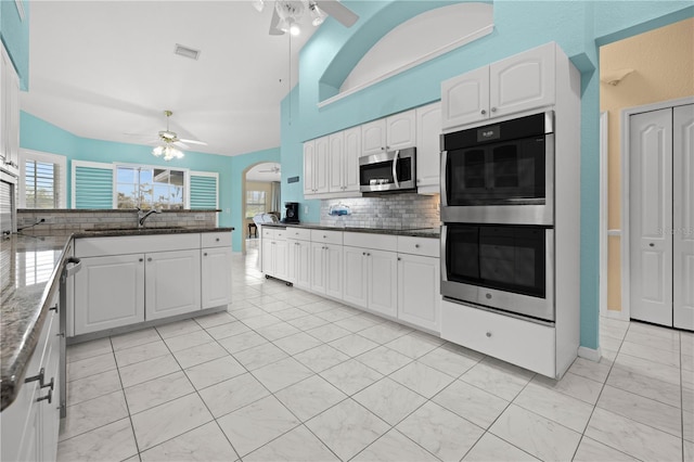 kitchen with visible vents, appliances with stainless steel finishes, a ceiling fan, and white cabinetry