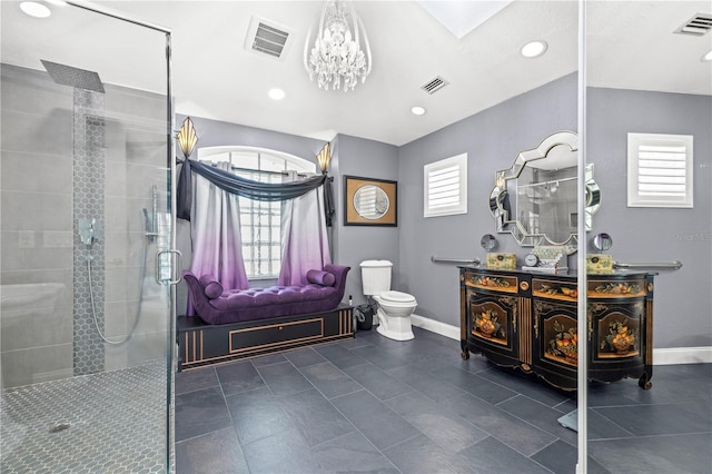 full bathroom with toilet, baseboards, visible vents, and tiled shower