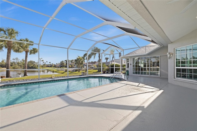 outdoor pool featuring a lanai and a patio area