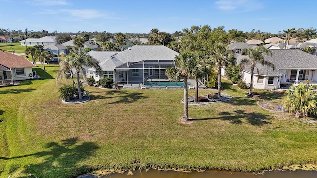 aerial view with a residential view and a water view