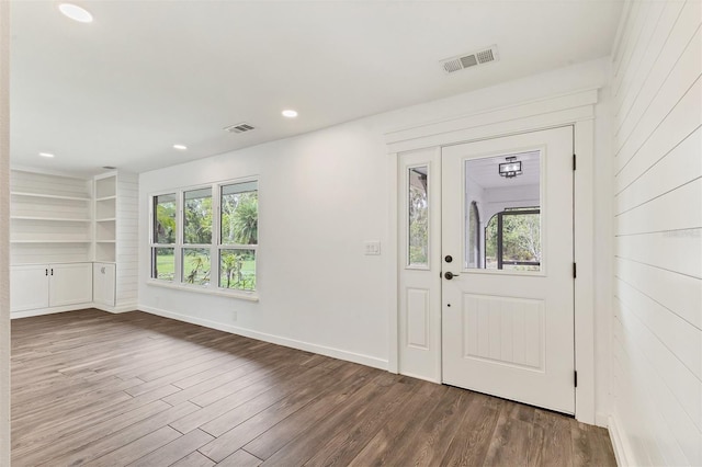 entryway featuring recessed lighting, visible vents, plenty of natural light, and wood finished floors