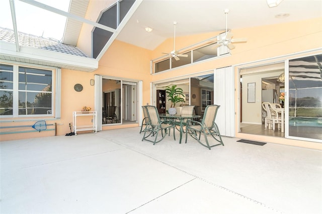 view of patio / terrace featuring outdoor dining area and ceiling fan