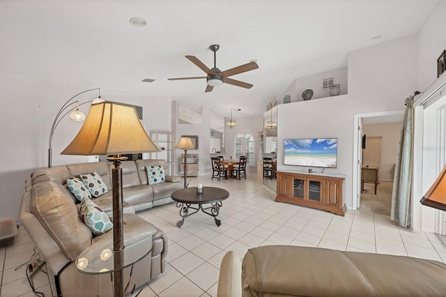 living room featuring light tile patterned floors, high vaulted ceiling, visible vents, and a ceiling fan