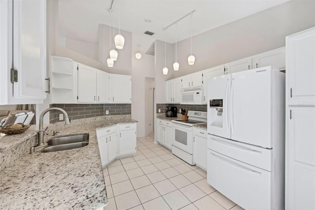 kitchen featuring white appliances, a sink, white cabinetry, open shelves, and tasteful backsplash