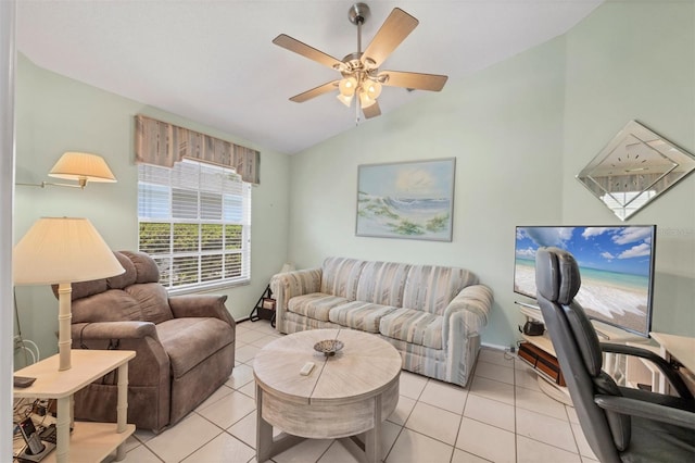 living room featuring light tile patterned floors, vaulted ceiling, and a ceiling fan