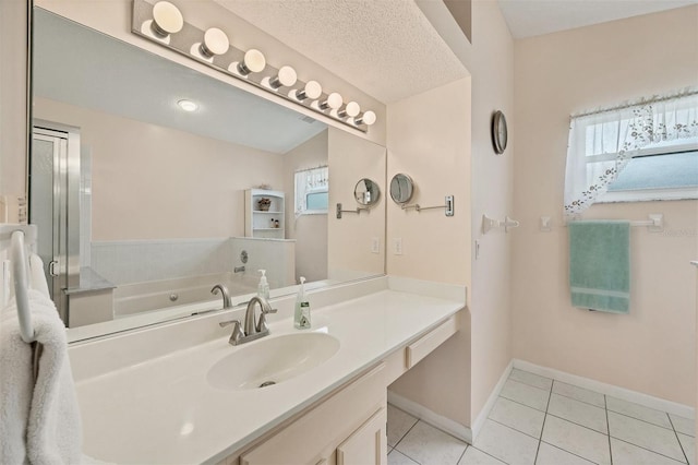 bathroom featuring baseboards, a shower with door, tile patterned flooring, vanity, and a bath