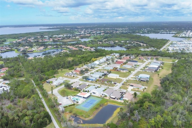 bird's eye view with a water view and a residential view