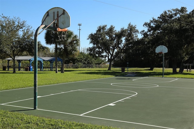 view of sport court featuring a yard, a gazebo, and community basketball court