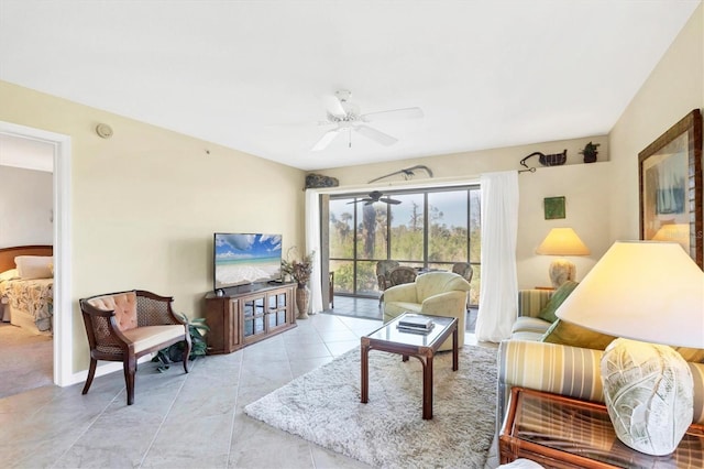 tiled living room with ceiling fan