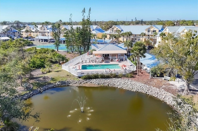 aerial view with a residential view and a water view