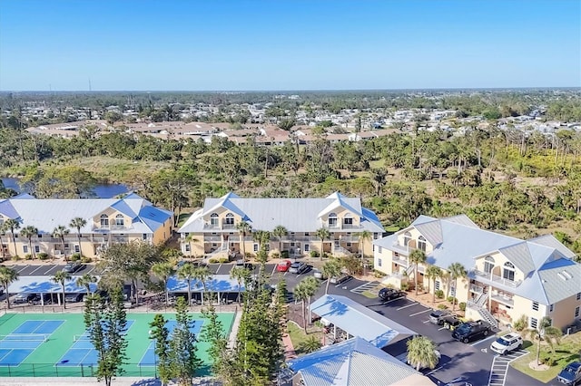 birds eye view of property with a residential view