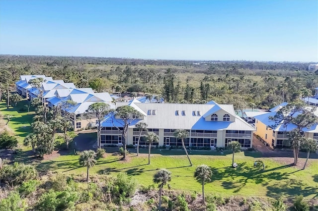 aerial view featuring a view of trees