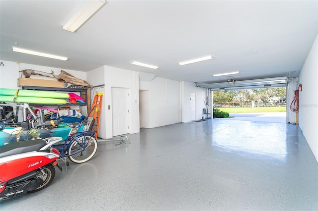 garage featuring a garage door opener