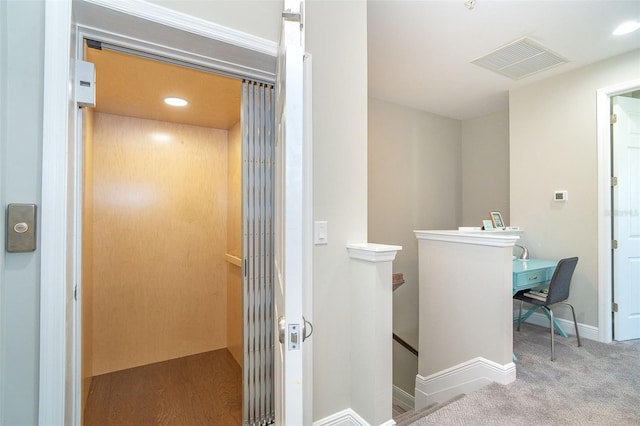 bathroom with recessed lighting, elevator, visible vents, and baseboards