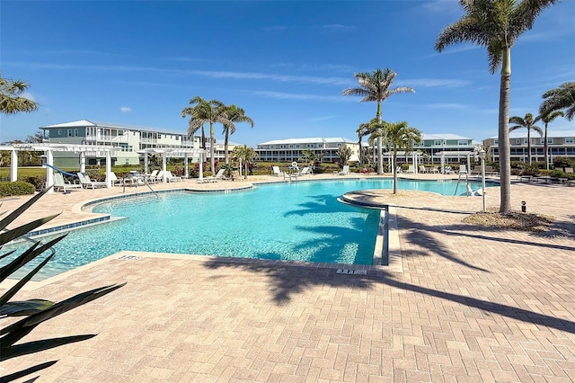 community pool featuring a patio