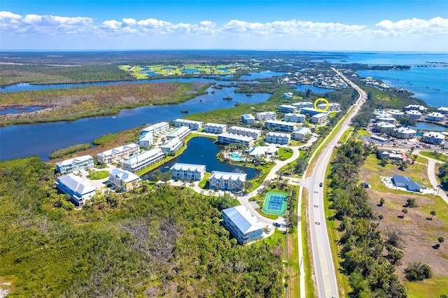 drone / aerial view featuring a water view