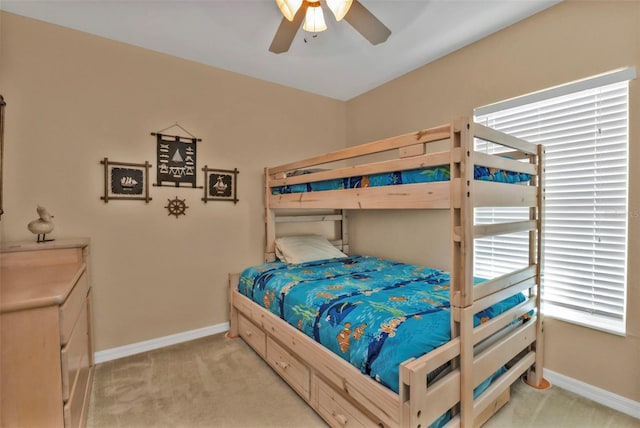 bedroom featuring carpet, ceiling fan, and baseboards