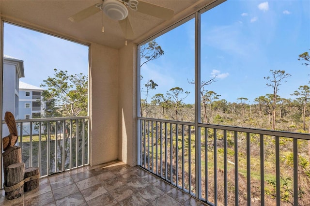 balcony featuring a ceiling fan