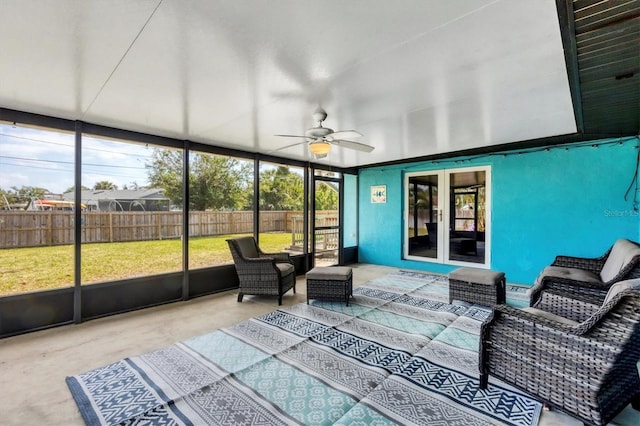 sunroom / solarium with ceiling fan