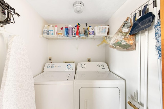 laundry area with washing machine and dryer and laundry area