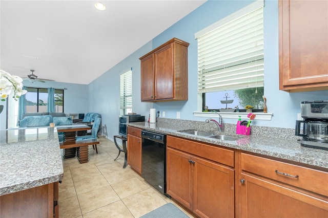 kitchen with light tile patterned floors, a sink, a ceiling fan, brown cabinets, and dishwasher