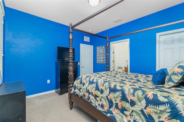 bedroom featuring carpet, visible vents, and baseboards