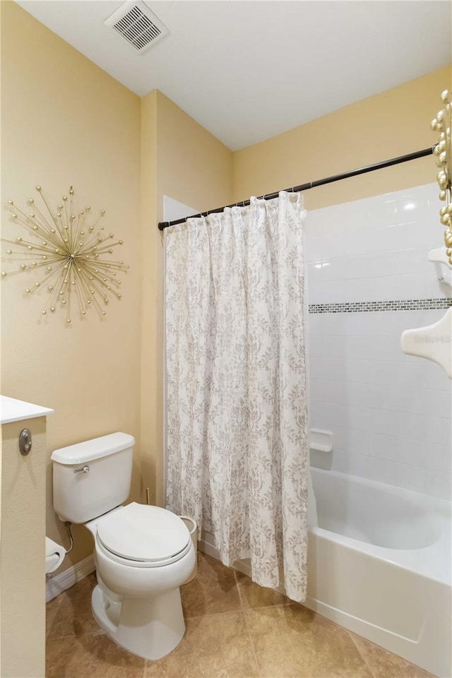 full bathroom with toilet, shower / bath combination with curtain, tile patterned flooring, and visible vents