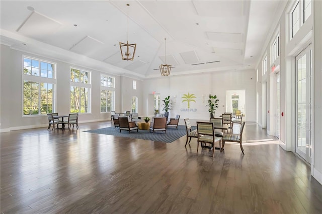 interior space with vaulted ceiling and a notable chandelier