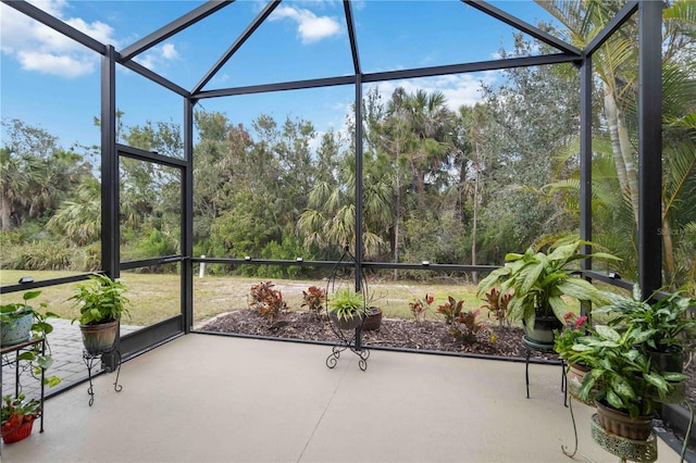 unfurnished sunroom featuring a wealth of natural light