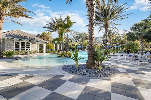 pool featuring a patio area