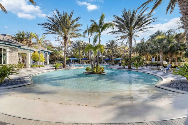 pool with a patio area