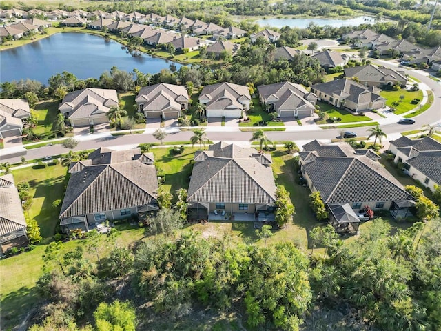 aerial view featuring a residential view and a water view